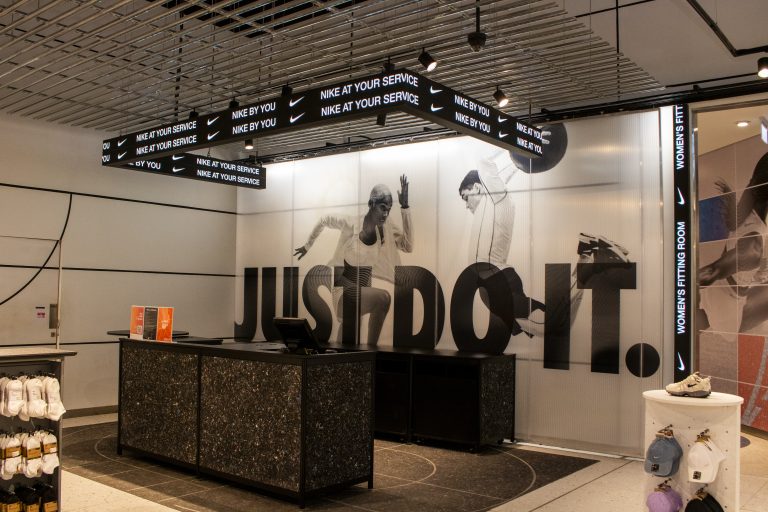 NIKE- Cashdesk Ticker Tape and Background Signage